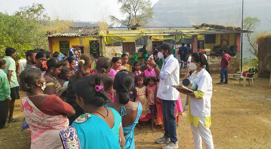 Young male doctor supporting heart health awareness in rural India